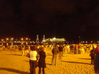 Salida del Queen Mary vista desde la playa de las Alcaravaneras